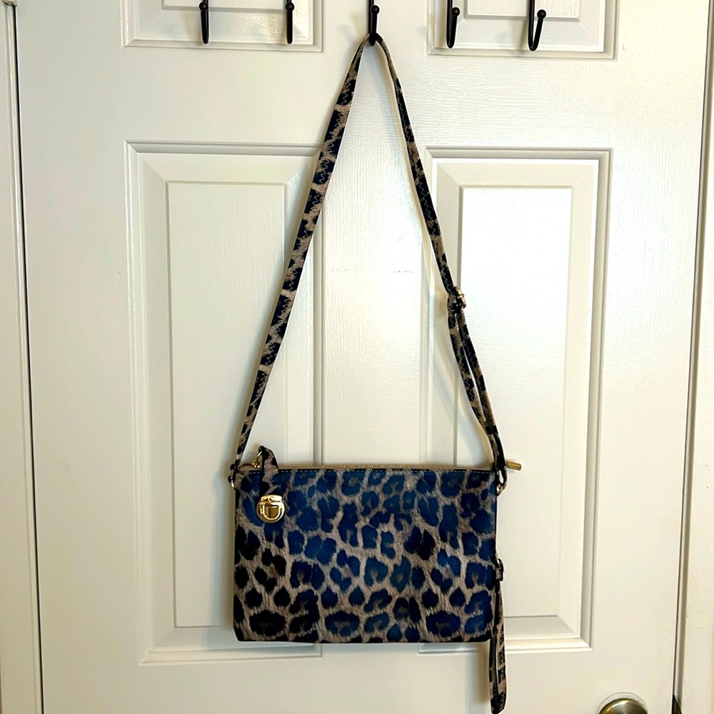 Leopard Print Vegan Leather
Clutch NWOT